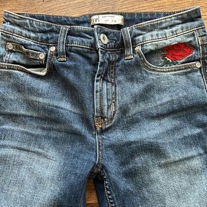 Free People jeans w/ rose appliqués. Women’s sz 25.